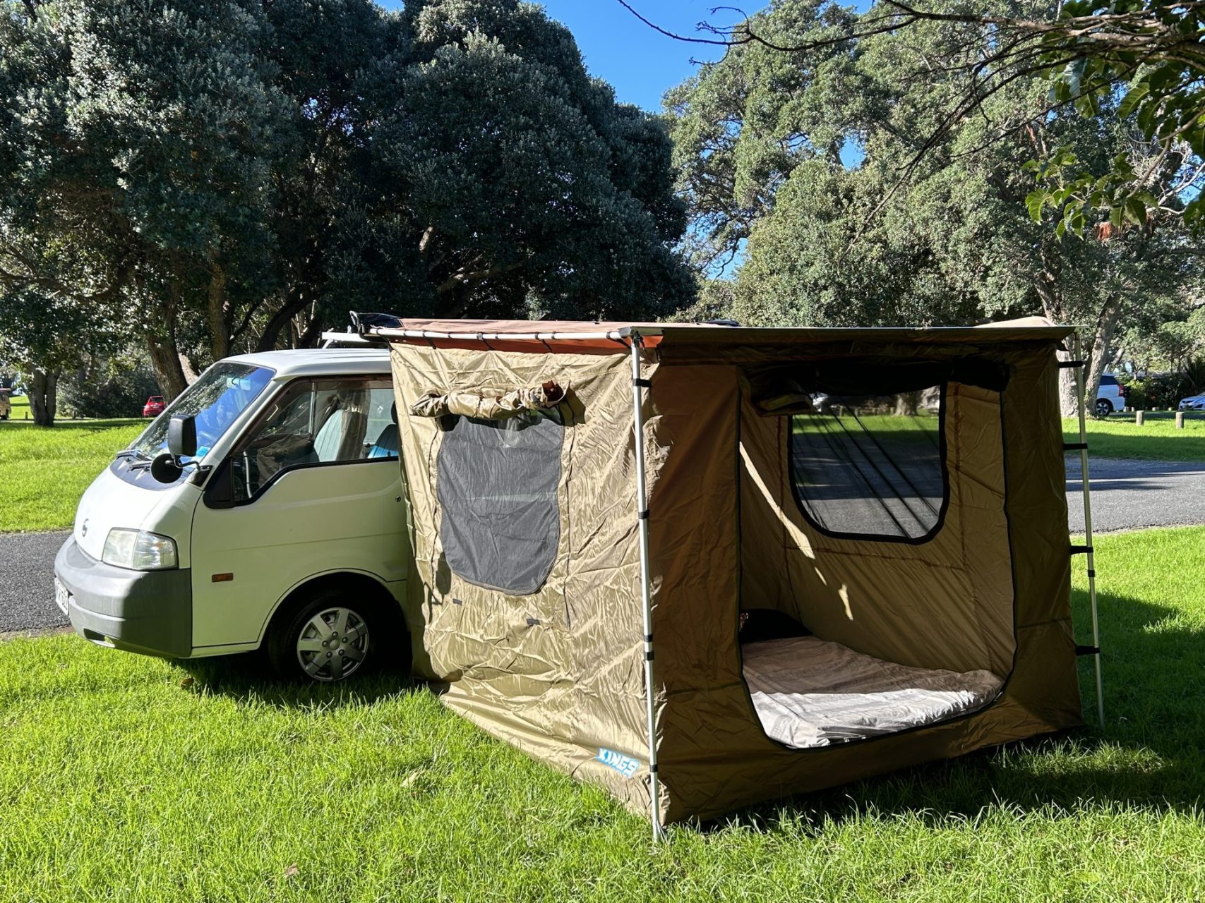 Setup of Kings Awning (included in hire). Tent setup and Roof Box (optional  extras) for Kiwi the Camper. : New Zealand Campervans